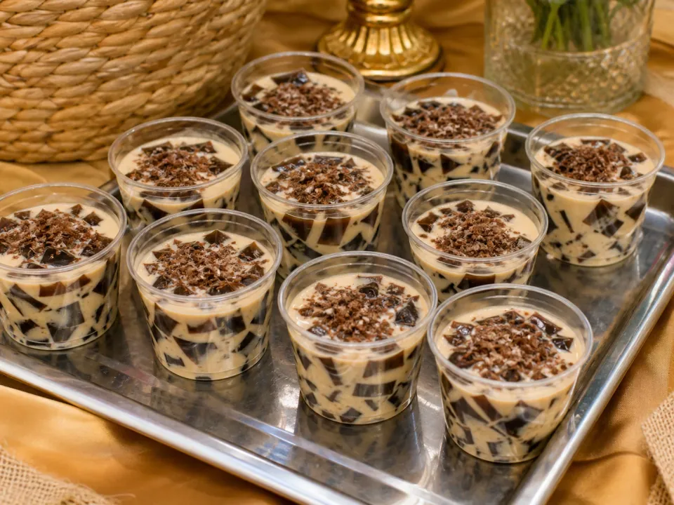 Coffee jelly dessert cups on a catering tray