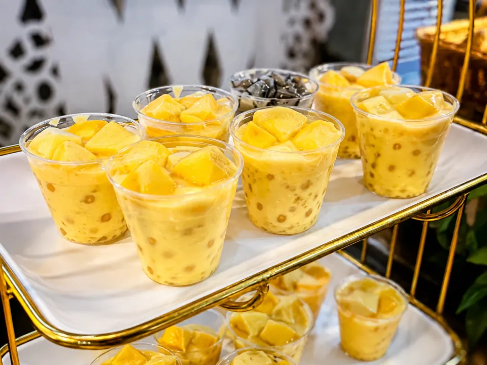 Mango tapioca dessert cups with mango chunks
